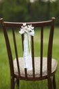Close up of flower decorated on wedding vintage chair