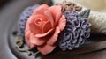 a close up of a flower on a wooden table with a knitted hat in the background and a crochet hat on the top of the hat