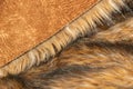 Close-up of a fluffy dark brown faux fur fabric with a background texture Royalty Free Stock Photo