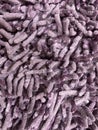 close up fluffy purple doormats or foot mat fabric texture. usually placed on the floor Royalty Free Stock Photo