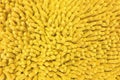 Close up of Fluffy Yellow Fabric Background Texture