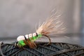 Close-up of a Fly Fishing Lure on string blurred background Royalty Free Stock Photo