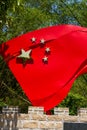 Close-up of flying five-star red flag sculpture Royalty Free Stock Photo