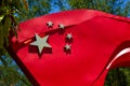 Close-up of flying five-star red flag sculpture Royalty Free Stock Photo