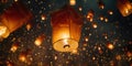 Close-up of a flying sky lanterns with a candle being released during a cultural celebration. Traditional floating chinese Royalty Free Stock Photo