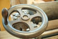 A close-up of the flywheel of an industrial steam engine Royalty Free Stock Photo