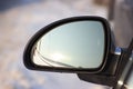 Close up and focus car driving in the city with viewed from outside driver window with blurred reflections on on the mirror with Royalty Free Stock Photo