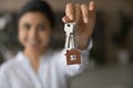 Close up focus on keys, excited tenant rejoicing relocation Royalty Free Stock Photo