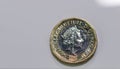 Close up focus photos of new United kingdom Pound coin isolated on a white background