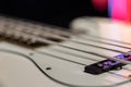 Close-up in focus of strings on a bass guitar on a blurred background Royalty Free Stock Photo