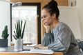 Close up focused African American businesswoman in glasses using laptop Royalty Free Stock Photo