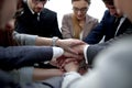 Close up.a focused business team putting their hands together Royalty Free Stock Photo