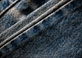 Close up of fold dark blue jean denim fabric Royalty Free Stock Photo