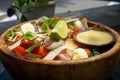 Close Up Food Photo of Healthy Mixed Salad Bowl with Chicken, Parmesan Slices, Boiled Qual Eggs, Basil, Cherry Tomatoes, Fried Royalty Free Stock Photo