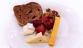 Artisan Cheese, Fruit and Nut Plate isolated on a white plate background