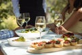 Close-up of food and wine glass on dining table