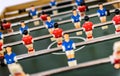 Close up of foosball Table Soccer Game match figures. Royalty Free Stock Photo