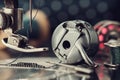 Close up on foot of vintage sewing machine, metal shuttle and spool of thread Royalty Free Stock Photo