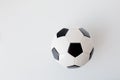 Close up of football or soccer ball over white Royalty Free Stock Photo