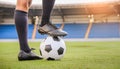 Close Up Football or Soccer Player Foot Playing With the Ball in Stadium Royalty Free Stock Photo