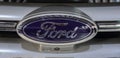 The close up of Ford logotype.