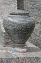 Close up of forgotten empty flower vase on grave