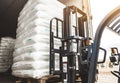 Close up Forklift loader for warehouse works outdoors with risen forks Royalty Free Stock Photo