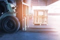 Close-Up Forklift Sesame with Heavy Crate wooden at Warehouse. Cargo Shipment Load Warehousing.