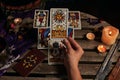 Close-up of a fortune teller reading tarot cards Royalty Free Stock Photo