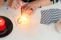 Close up of fortune teller woman hands make magic love spells.