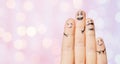 Close up of four fingers with smiley faces Royalty Free Stock Photo