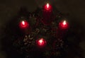 Close up of four red candles burning on advent wreath on evening. Merry Christmas, Advent crown decoration, 4th sunday, Christmas Royalty Free Stock Photo