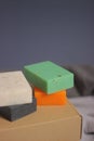 Close-up of four soaps neatly stacked on top of rectangular boxes Royalty Free Stock Photo