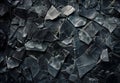 Close-up of fractured black stone texture