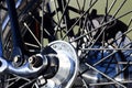 Fragment of chromed shiny wheel of old classic motorbike Royalty Free Stock Photo