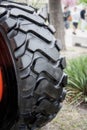 Close up fragment huge tire wheel of construction equipment