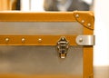 Close-up fragment of locks and fasteners on the vintage leather and metal suitcase brown Royalty Free Stock Photo