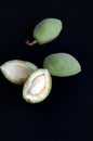 Close-up of fresh almonds on black background Royalty Free Stock Photo