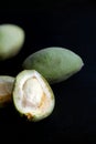 Close-up of fresh almonds on black background Royalty Free Stock Photo