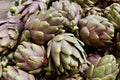 Close up of fresh artichokes at market stall in Sicily, Italy. Royalty Free Stock Photo