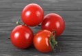 Close-up of fresh cherry tomatoes on wooden table Royalty Free Stock Photo