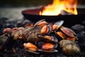 close-up of fresh clams next to campfire