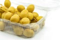 Close up fresh Date Palm fruit or Date fruit in cleared plastic box or container for sell on white background. Fresh Date fruit in