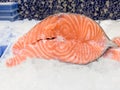 Close Up of fresh fillet salmon in a supermarket refrigerated display case