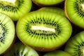 Fresh green kiwi fruit on solid green background for healthy eating concept Royalty Free Stock Photo