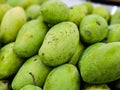 Close-up Fresh of Green Mango (Ma-Muang). Organic Mangoes pile Royalty Free Stock Photo