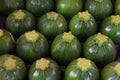 Close up fresh green zucchini on retail display Royalty Free Stock Photo