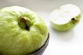 Close up of Fresh guava fruit in wooden bowl on the table. Royalty Free Stock Photo