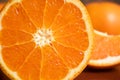 Close-up Fresh half orange on wooden table