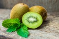 Close up fresh kiwi fruit on old wood background. Royalty Free Stock Photo